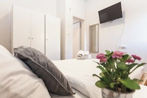Apartamento urbano | 1 quarto, escrivaninha, ferros/tábuas de passar roupa, Wi-Fi de cortesia