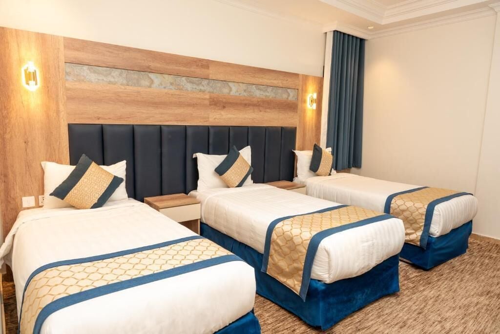 Triple Room | Egyptian cotton sheets, premium bedding, down duvets, memory-foam beds