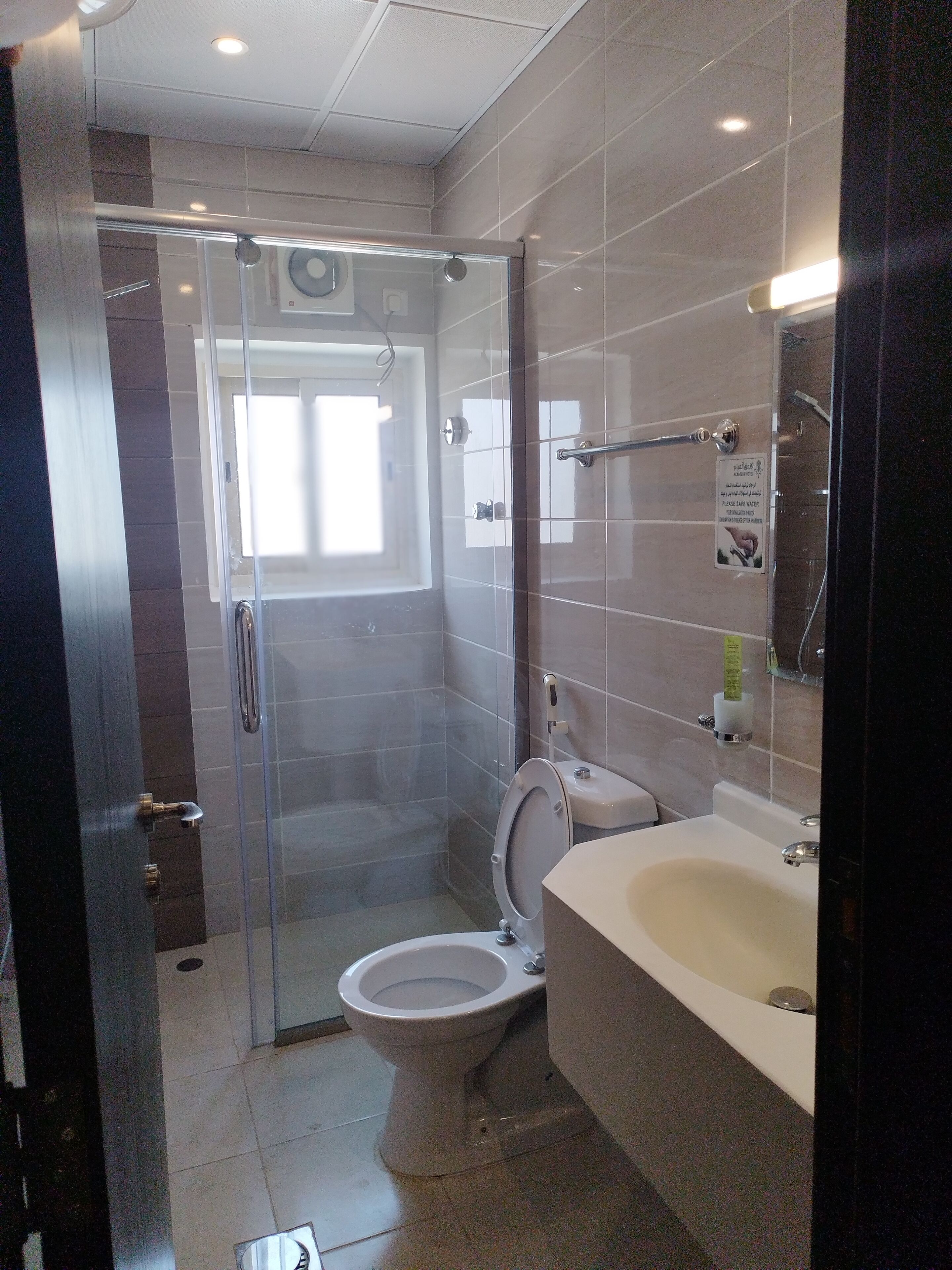 Shower, free toiletries, hair dryer, slippers