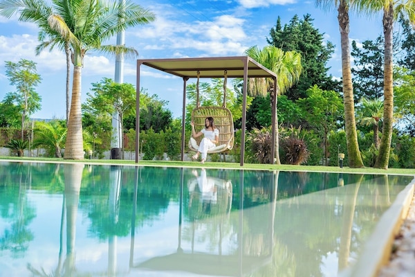 Outdoor pool, pool umbrellas, pool loungers