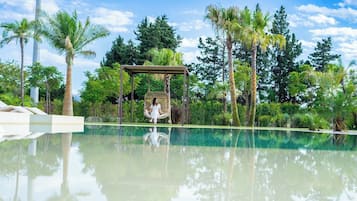 Outdoor pool, pool umbrellas, pool loungers