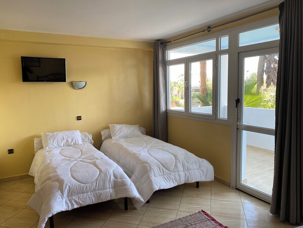 Economy Quadruple Room, City View