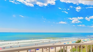 A beach with clear skies and a view of the ocean. - Huge 25 foot circle balcony/MODERN COASTAL/Best view in Myrtle Beach (Myrtle Beach)
