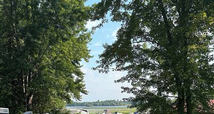 Cozy two bedroom cabin shores of Lake Nipissing. Enjoy the pool and lake views.