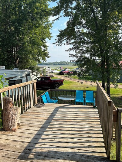 Cozy two bedroom cabin shores of Lake Nipissing. Enjoy the pool and lake views.