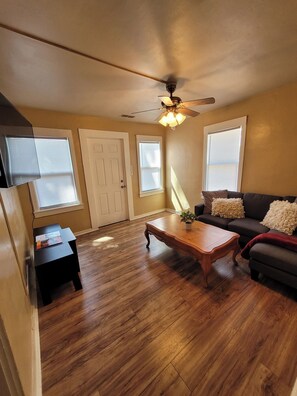 Living area - Cozy one bedroom close to downtown IA and IL with no cleaning fee! (Rock Island)