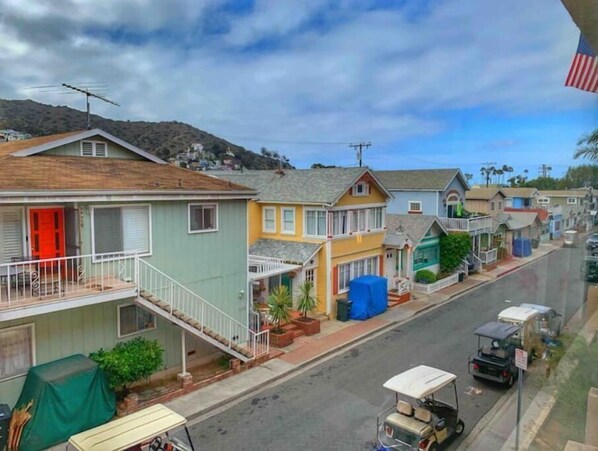 Stroll along this charming residential street lined with unique houses, each with its own distinct character.