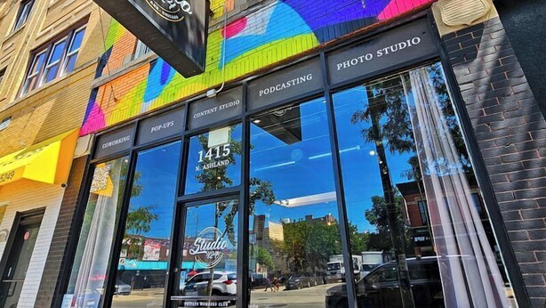 A colorful storefront with a sign for 'Studio 124' and 'Photo Studio'. - STAY (Chicago)