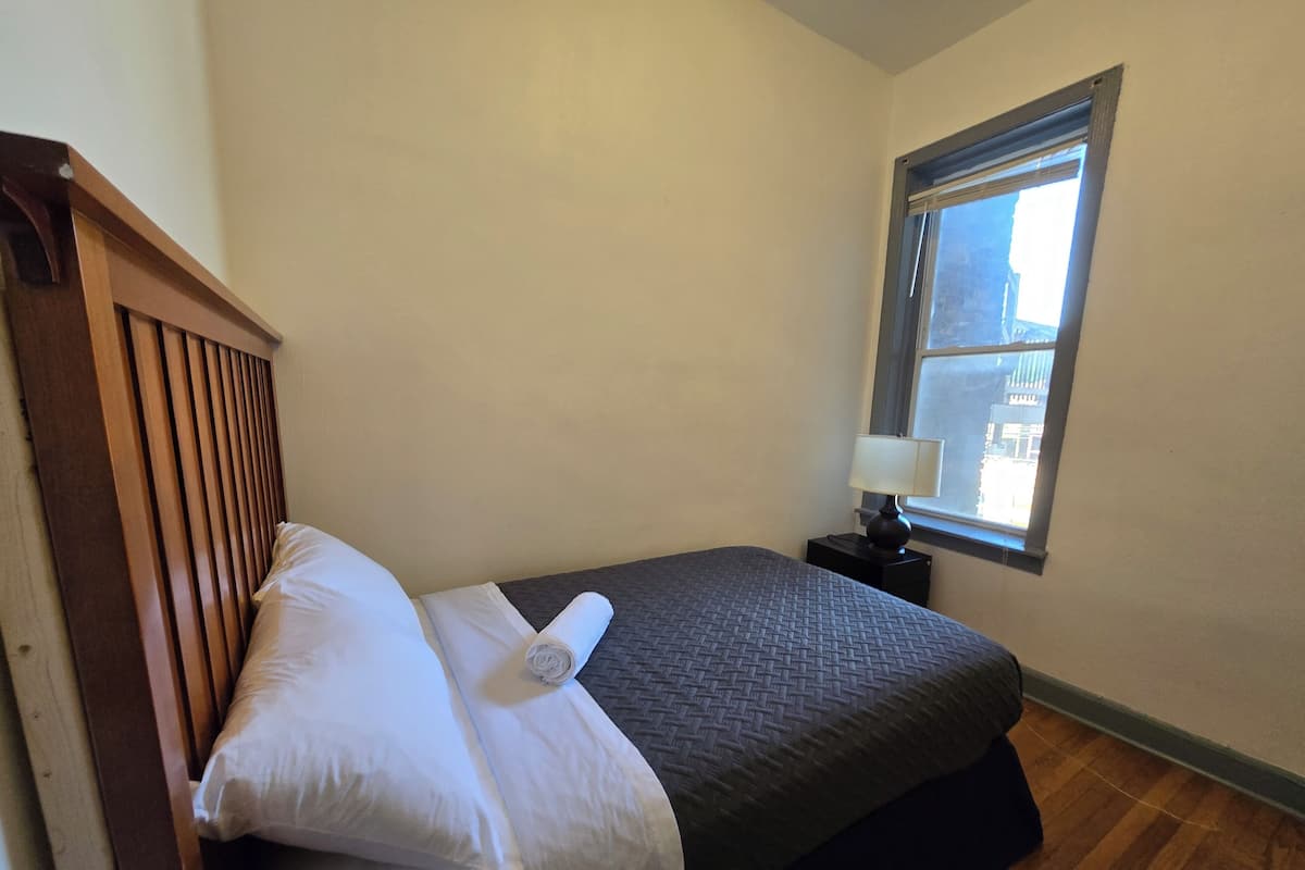 Individually furnished, desk, laptop workspace, iron/ironing board