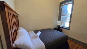 Individually furnished, desk, laptop workspace, iron/ironing board