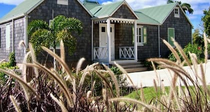 Charming Nevis Cottage with pool and ocean view on grounds of Hermitage Inn