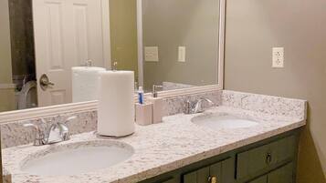 Hair dryer, towels, soap, toilet paper