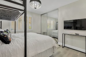 2 bedrooms, desk, iron/ironing board, travel crib