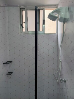 Shower, hair dryer, towels, soap