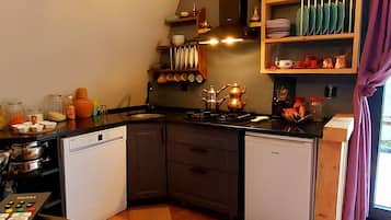 Deluxe Bungalow, 2 Bedrooms, River View | Private kitchen | Mini-fridge, stovetop, dishwasher, ice maker