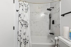 Hair dryer, towels, soap, shampoo
