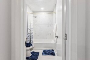 Hair dryer, towels, soap, shampoo