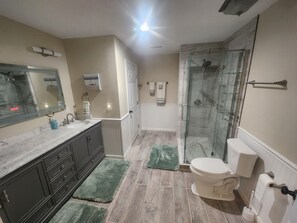 Shower, hair dryer, towels, soap