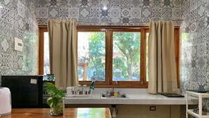 Habitación Deluxe | Cocina privada