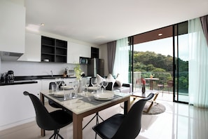 Apartamento Deluxe | Cocina privada | Hervidor eléctrico y tostadora