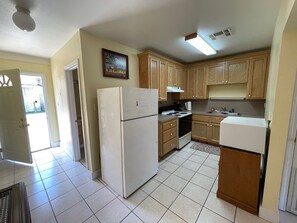 Private kitchen - Cozy waterfront studio apartment with a covered deck on Bayou Pierre Part.   (Pierre Part)