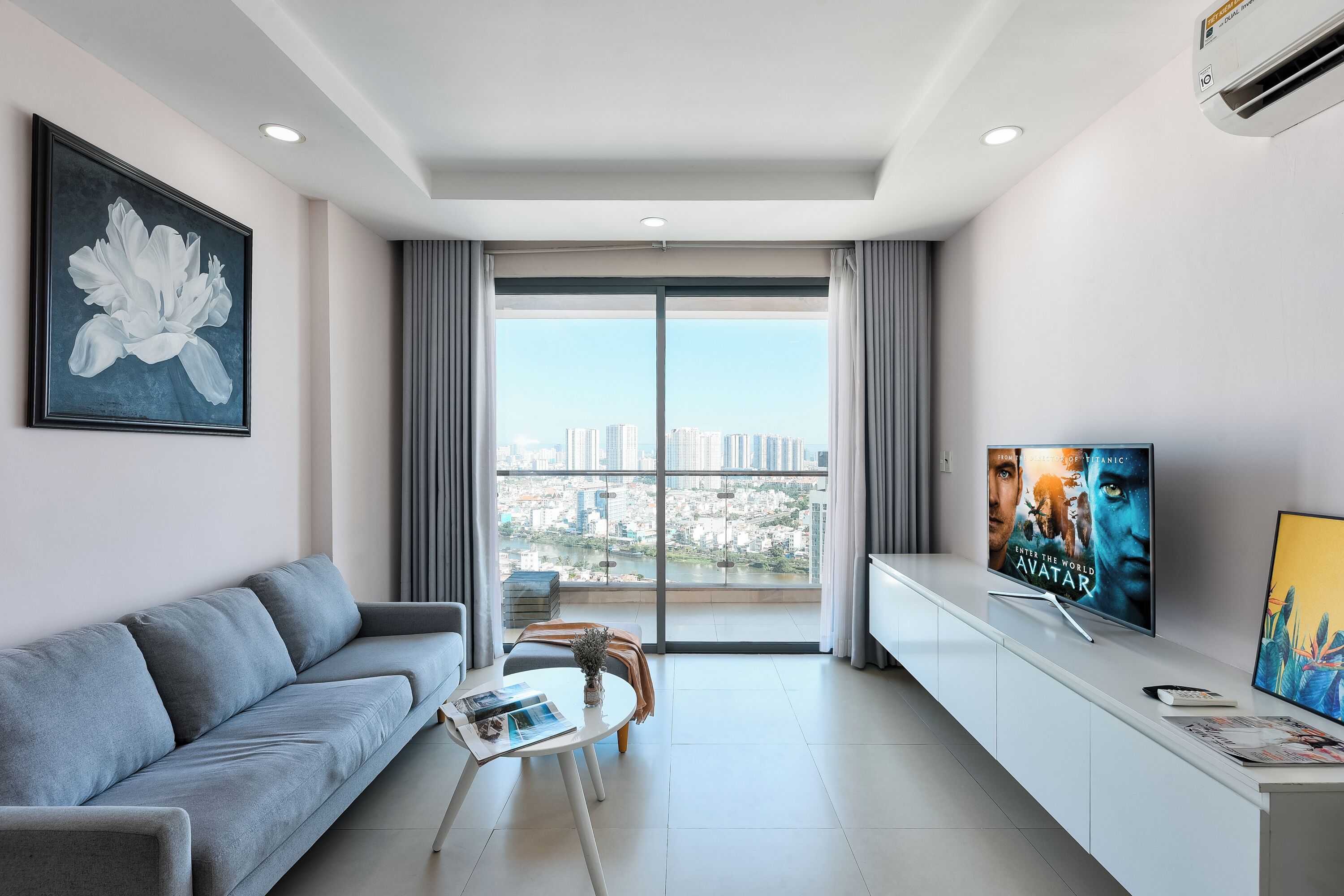 Deluxe Apartment | Living area | 50-inch Smart TV with cable channels, Netflix, streaming services