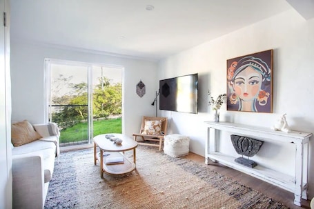 Smart TV. La Sirena — One Bedroom Coastal Living Apartment