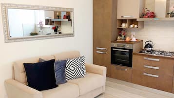 Superior Apartment, Non Smoking, Private Bathroom | Living area | 43-inch Smart TV with digital channels, Netflix, streaming services