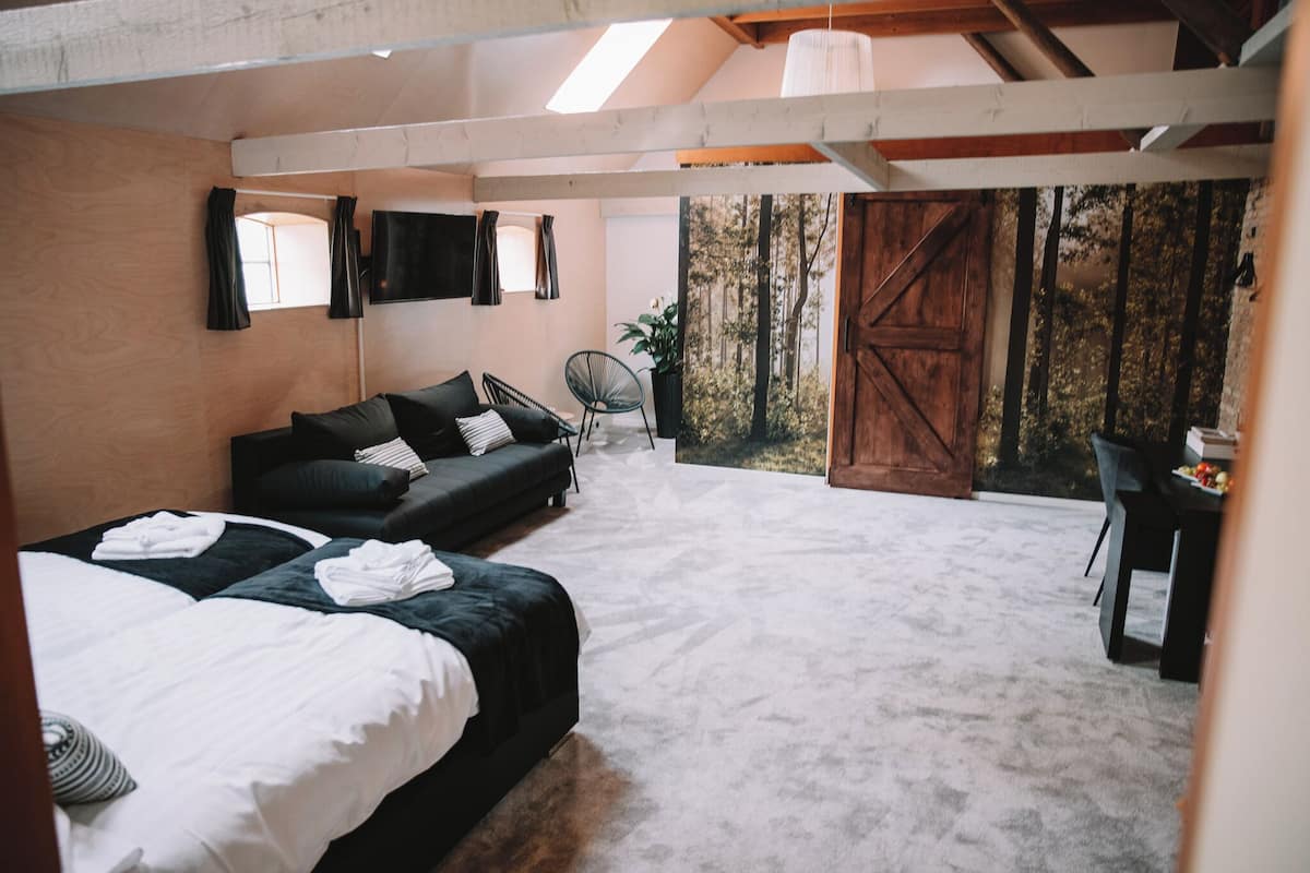 Suite Deluxe | 1 camera, con arredamento individuale, una scrivania, postazione laptop