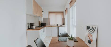 Apartment | Private kitchen | Fridge, microwave, coffee grinder, cookware/dishes/utensils