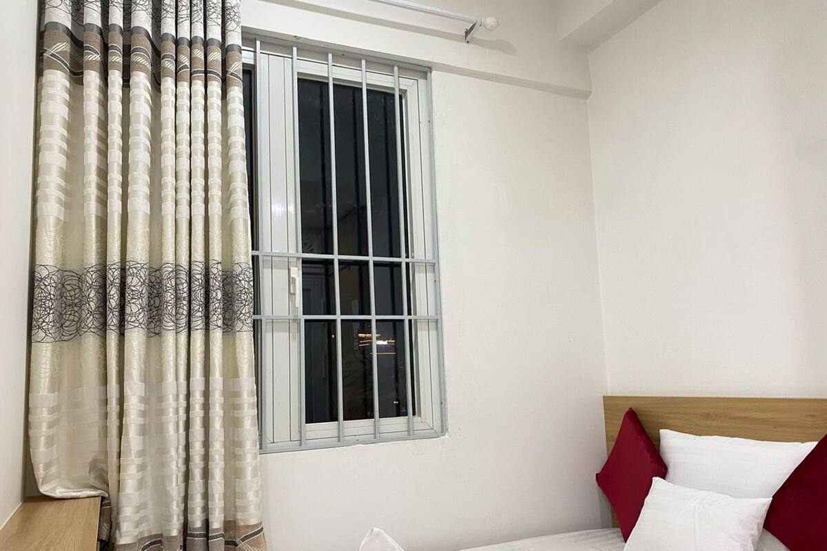 Exclusive Triple Room, City View | Minibar, in-room safe, desk, laptop workspace