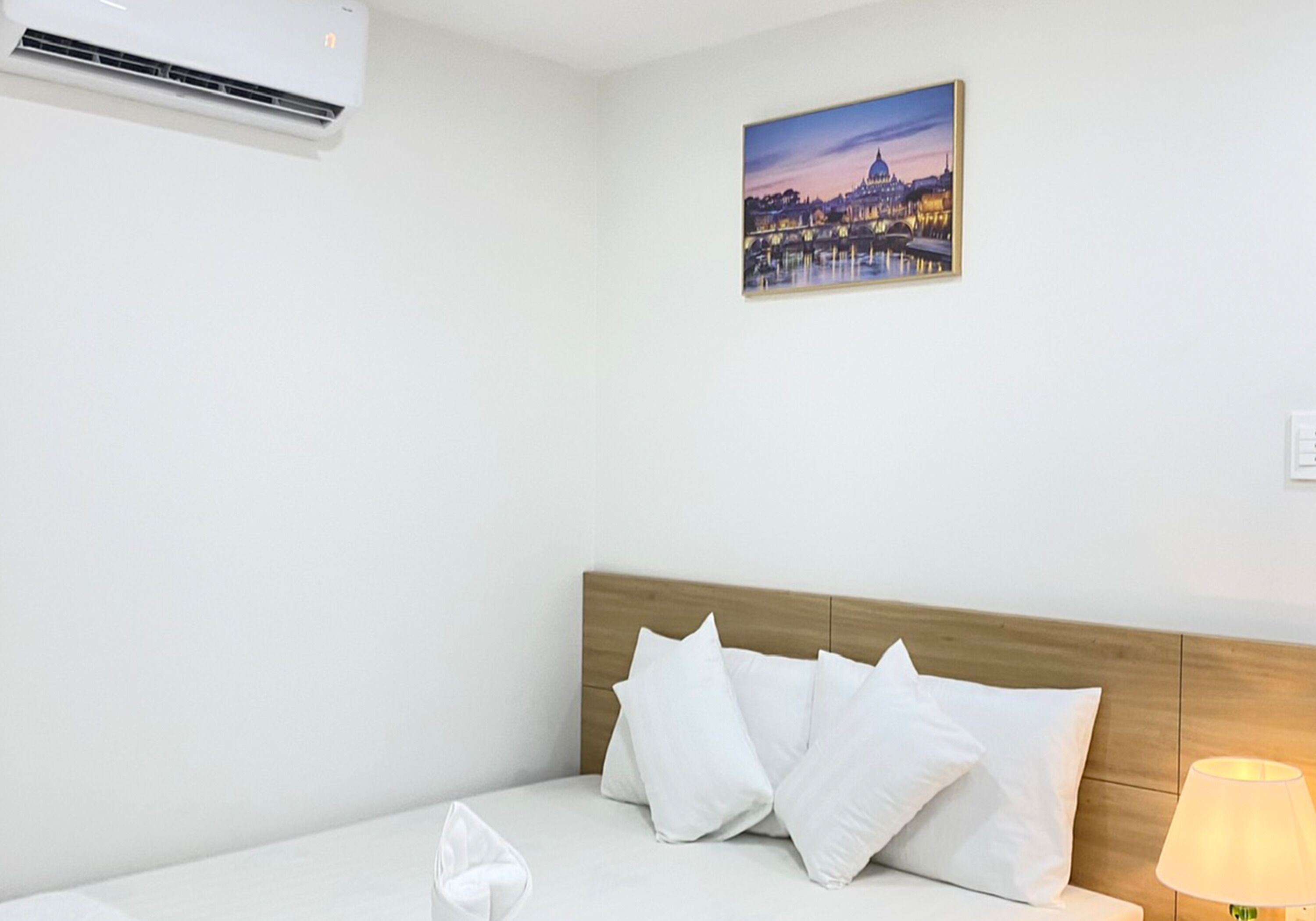 Exclusive Triple Room, City View | Minibar, in-room safe, individually decorated, individually furnished