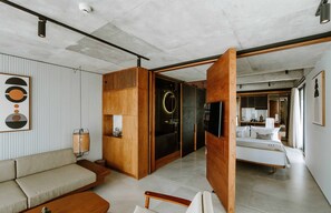 Premier Pool Suite Plus King | Living room | 43-inch Smart TV with digital channels, Netflix, streaming services