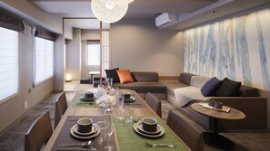 Departamento Premium (Suite) | Área de sala de estar | Televisión de pantalla plana 