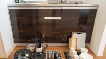 Fridge, microwave, cookware/dishes/utensils