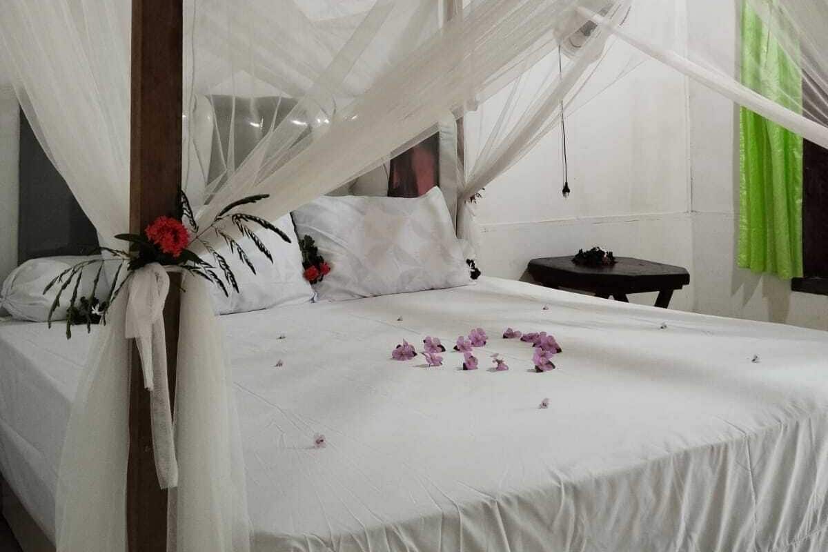 Eenvoudige kamer, 1 twee- of 2 eenpersoonsbedden, uitzicht op tuin | Gratis wifi
