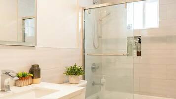 Hair dryer, towels, soap, shampoo