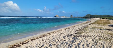 On the beach, sun-loungers, beach towels