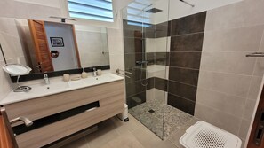 Shower, hair dryer, towels, soap