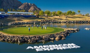 Play a round of golf on this scenic course surrounded by a rocky shoreline and water hazard.