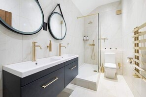 Shower, eco-friendly toiletries, hair dryer, bidet