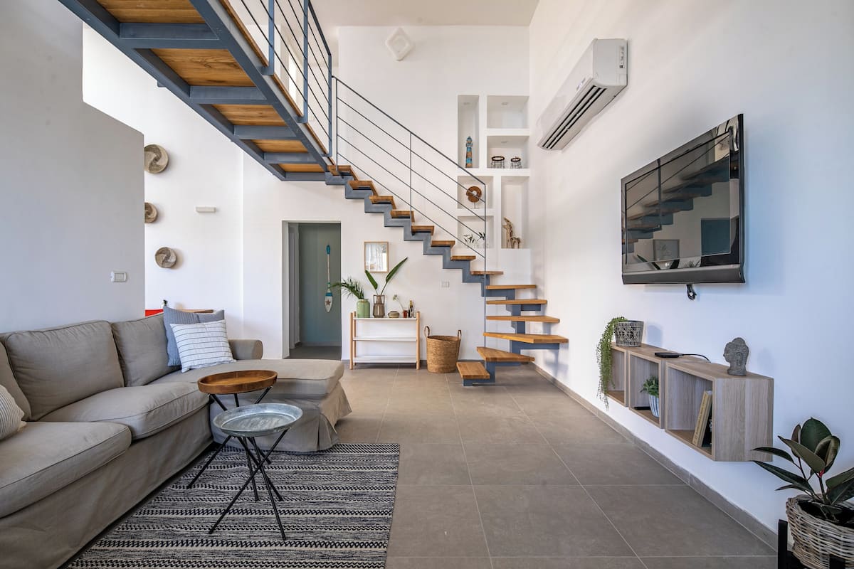 Departamento, 4 habitaciones, balcón | Área de sala de estar | Televisión de pantalla plana, Netflix y servicios de streaming