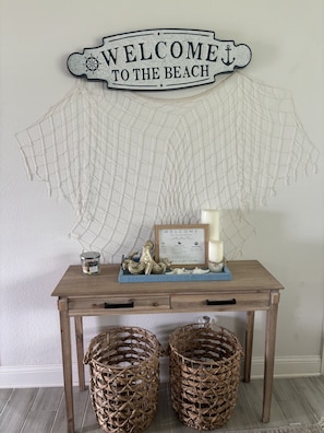 Welcome to the beach, where you can enjoy a convenient workspace with a table and complimentary WiFi.