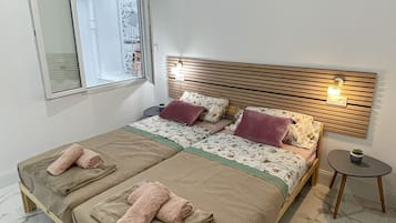 3 slaapkamers, een bureau, een strijkplank/strijkijzer, wifi