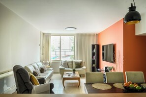 公寓 | 起居区 | 65-英寸智能电视（配备有线频道）