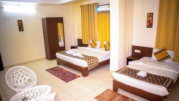 Family Quadruple Room, 1 Bedroom, Hill View | Pillow-top beds, free WiFi, bed sheets