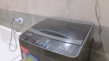 Superior Studio Suite | Bathroom | Deep soaking tub, rainfall showerhead, children's robes, slippers