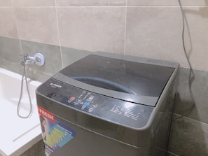 Superior Studio Suite | Bathroom | Deep-soaking bathtub, rainfall showerhead, children's dressing gowns - Midtown Homes & studios (Cairo)