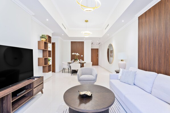 Deluxe Apartment | Living area - Nasma Holiday Homes - Dunya Tower (Dubai)