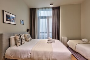 2 slaapkamers, een strijkplank/strijkijzer, gratis wifi, beddengoed